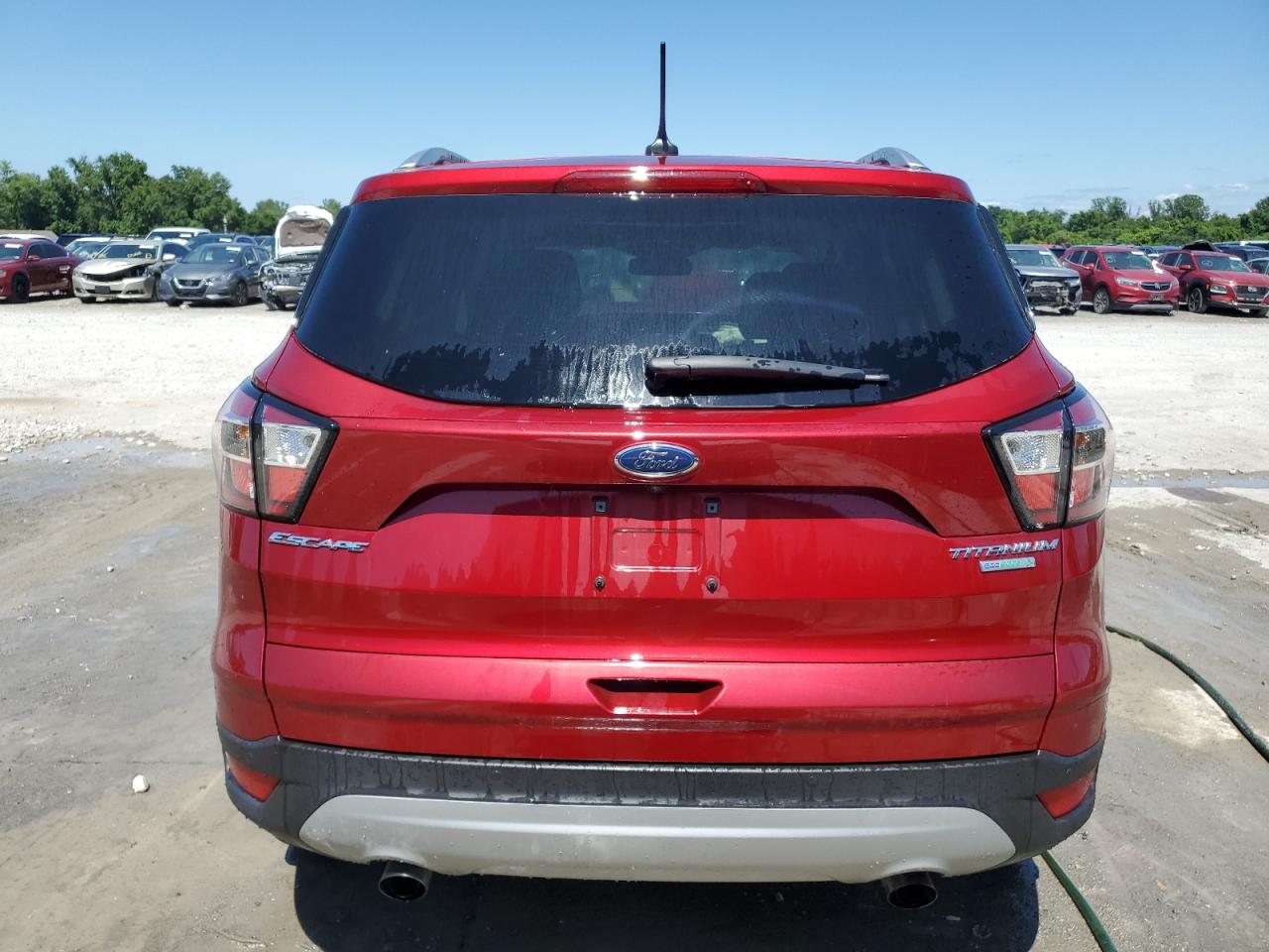 2018 Ford Escape Titanium VIN: 1FMCU0J94JUA09661 Lot: 62486274