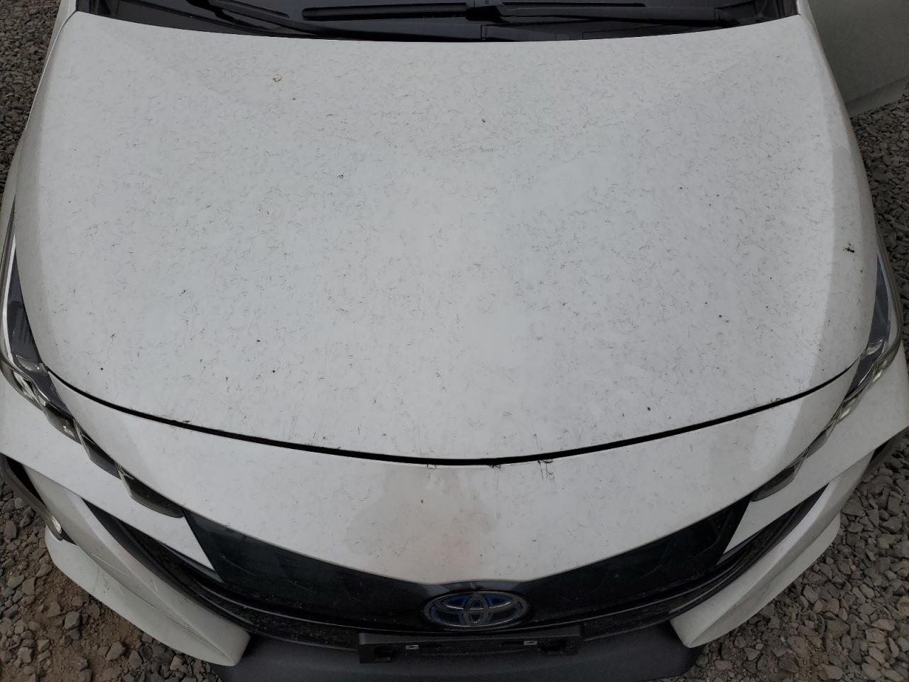 2022 Toyota Prius Prime Le VIN: JTDKAMFP1N3218133 Lot: 64518144