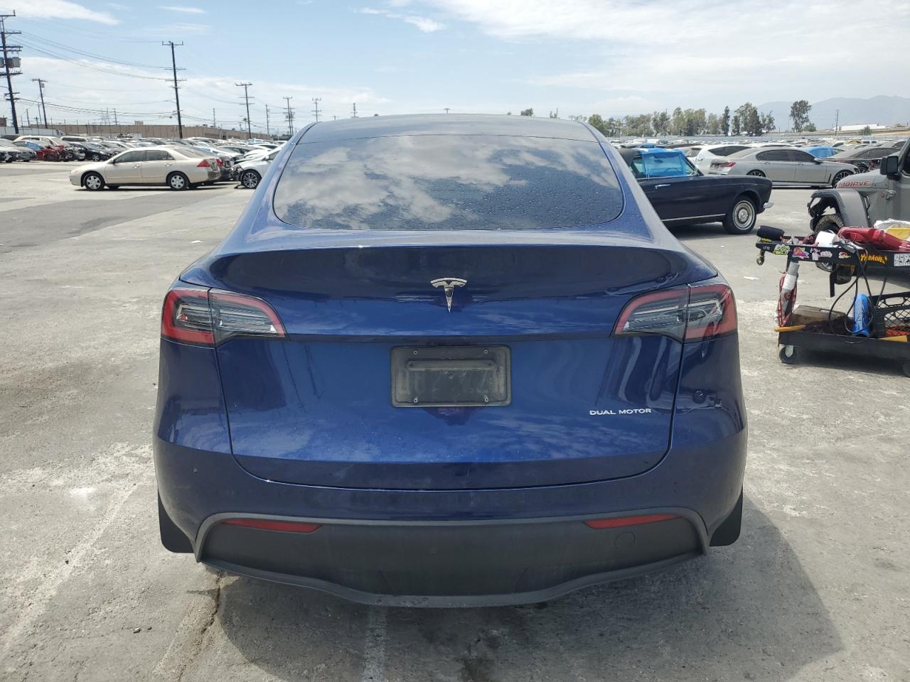 2023 Tesla Model Y VIN: 7SAYGDEE6PA198637 Lot: 62956474