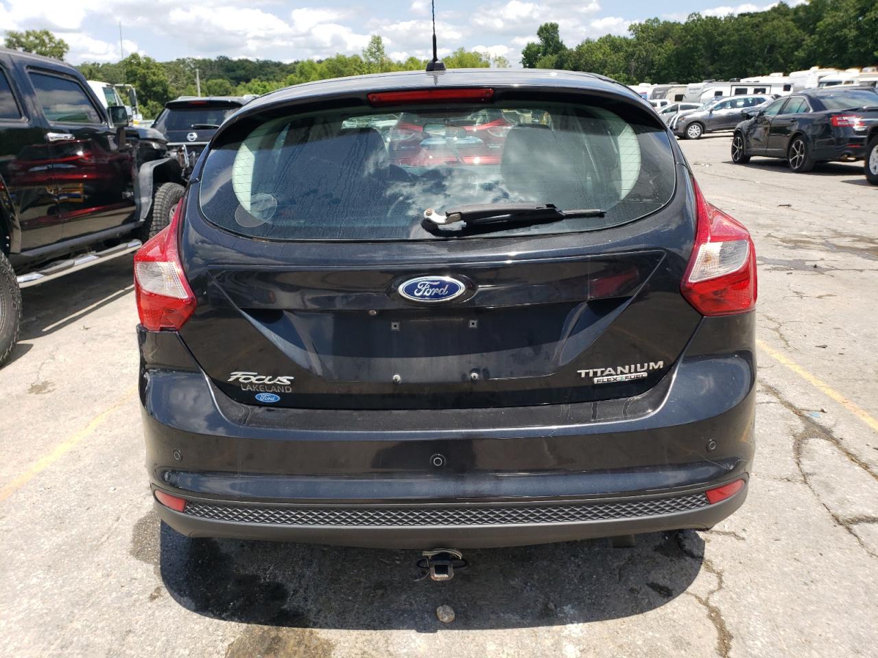 2014 Ford Focus Titanium VIN: 1FADP3N2XEL191477 Lot: 63699234