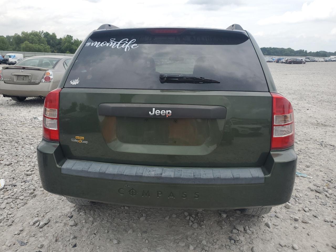 2009 Jeep Compass Sport VIN: 1J4FT47B09D165000 Lot: 65202374