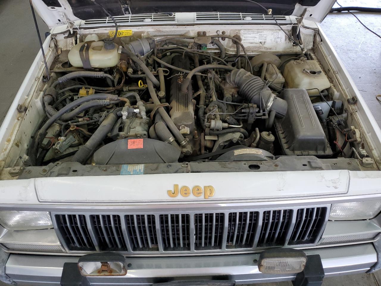 1990 Jeep Cherokee Laredo VIN: 1J4FJ57L1LL166898 Lot: 60490274