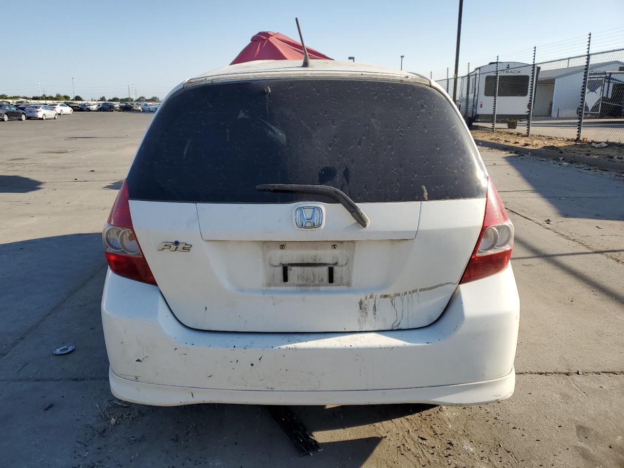 2007 Honda Fit S VIN: JHMGD38607S057700 Lot: 62886624