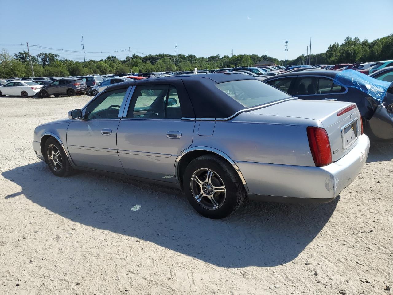 2005 Cadillac Deville VIN: 1G6KD54Y95U176672 Lot: 63383524