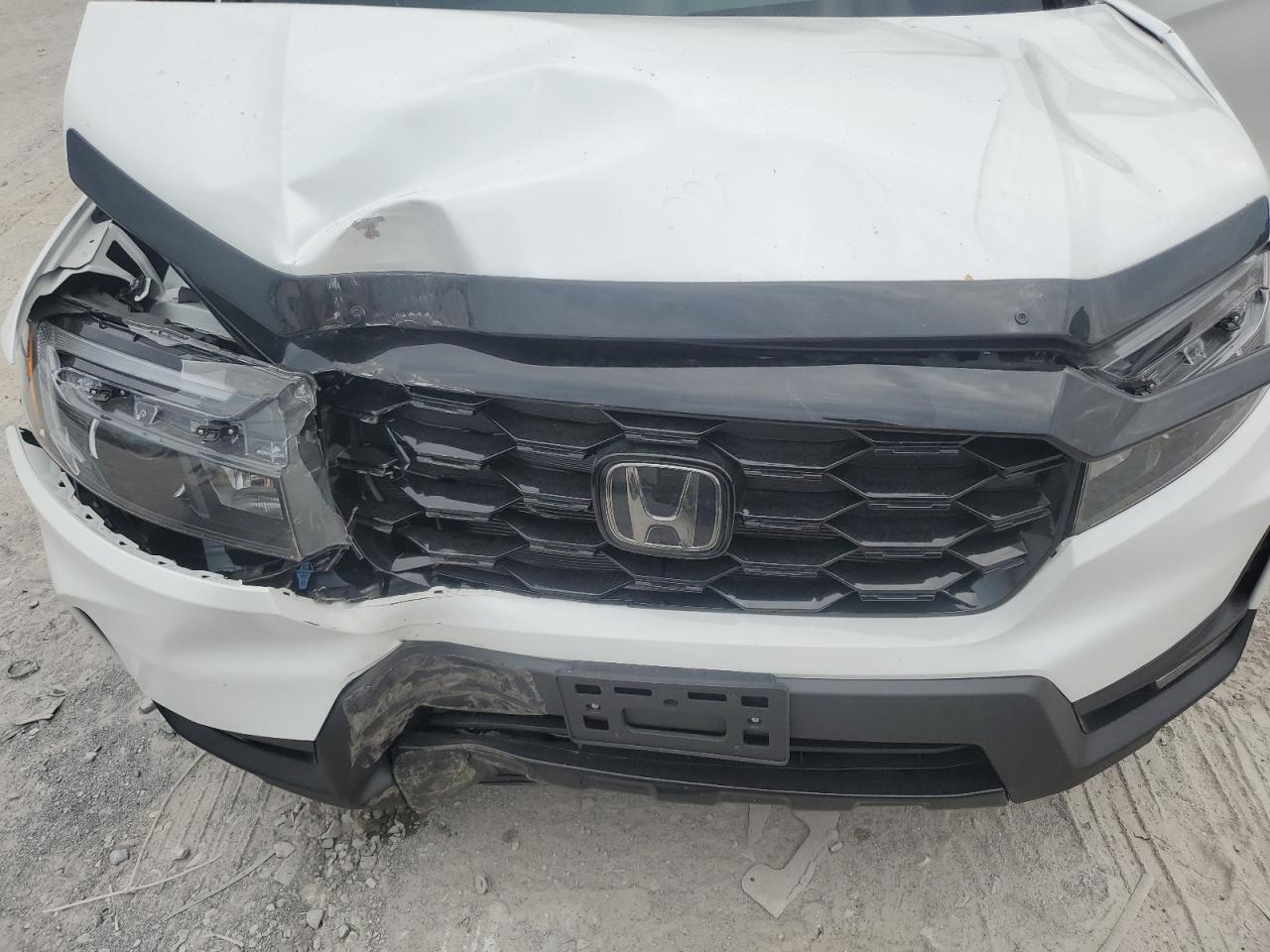 2022 Honda Passport Elite VIN: 5FNYF8H03NB000118 Lot: 63116334