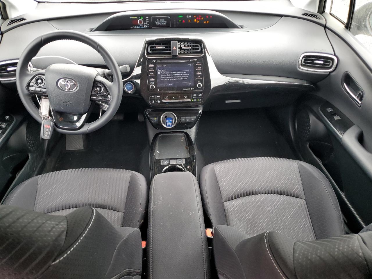 2022 Toyota Prius Prime Le VIN: JTDKAMFP1N3218133 Lot: 64518144