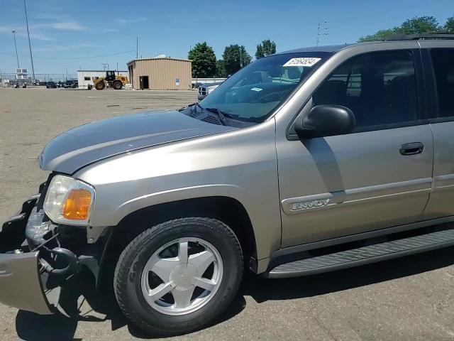 2002 GMC Envoy VIN: 1GKDT13SX22211052 Lot: 61564834