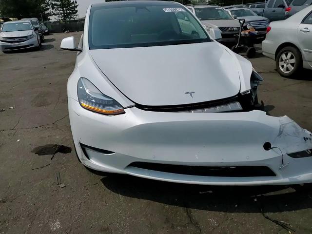 2022 Tesla Model Y VIN: 7SAYGDEE6NF321174 Lot: 64508674