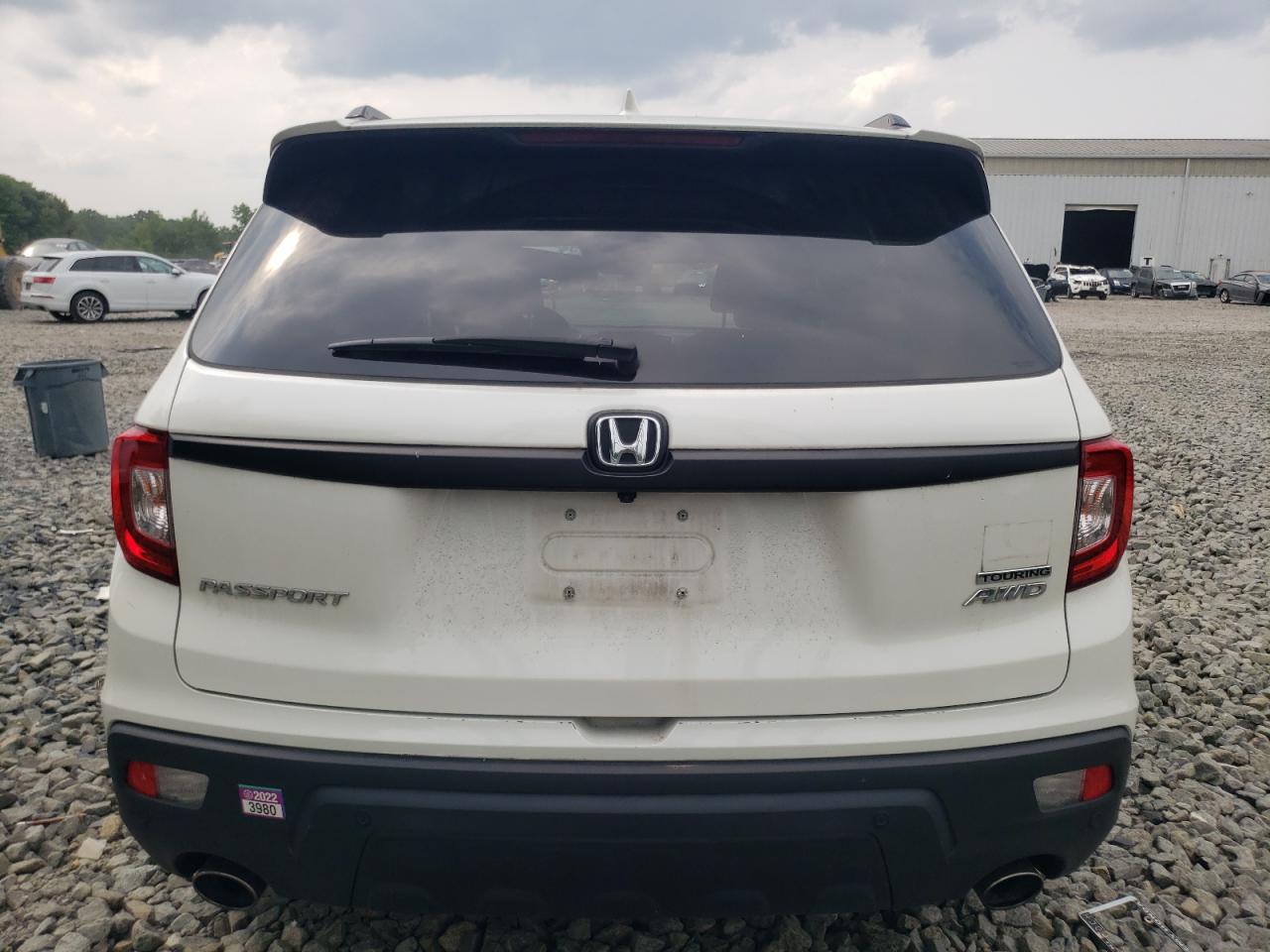 2019 Honda Passport Touring VIN: 5FNYF8H92KB010648 Lot: 64642184