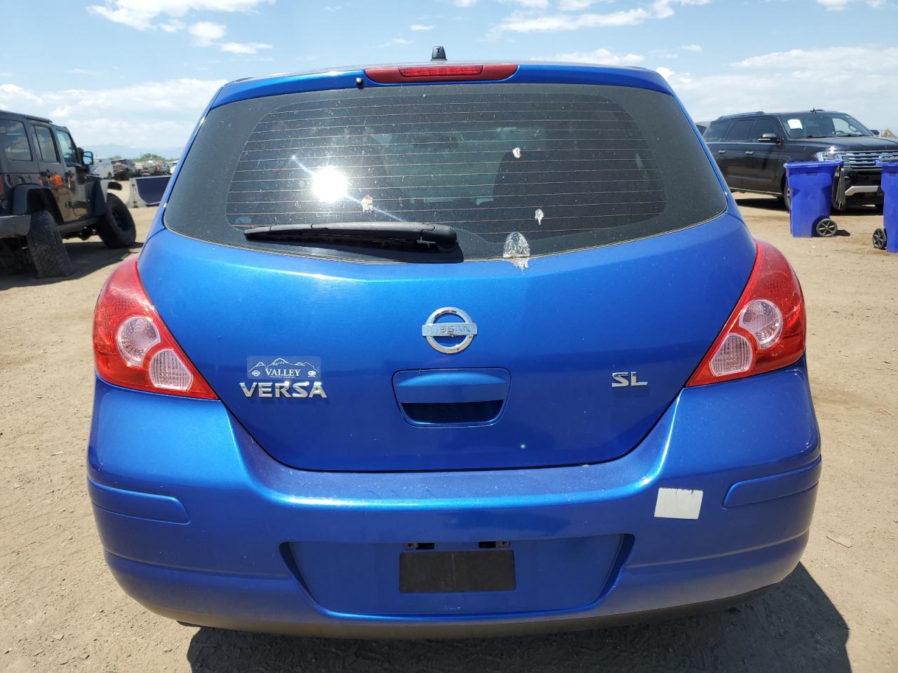 2009 Nissan Versa S VIN: 3N1BC13E59L406064 Lot: 62560574