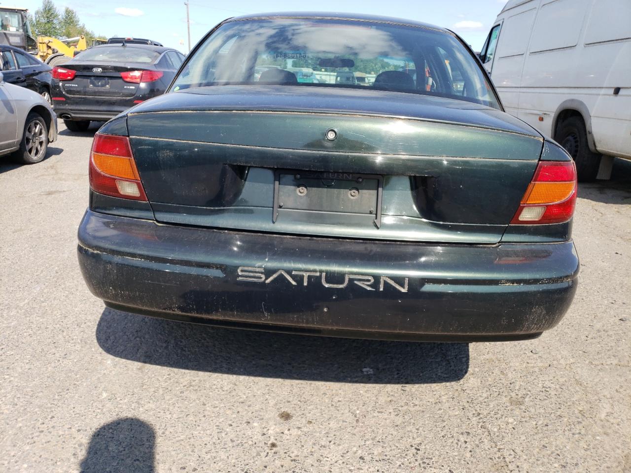 2000 Saturn Sl1 VIN: 1G8ZG5287YZ109866 Lot: 64703644