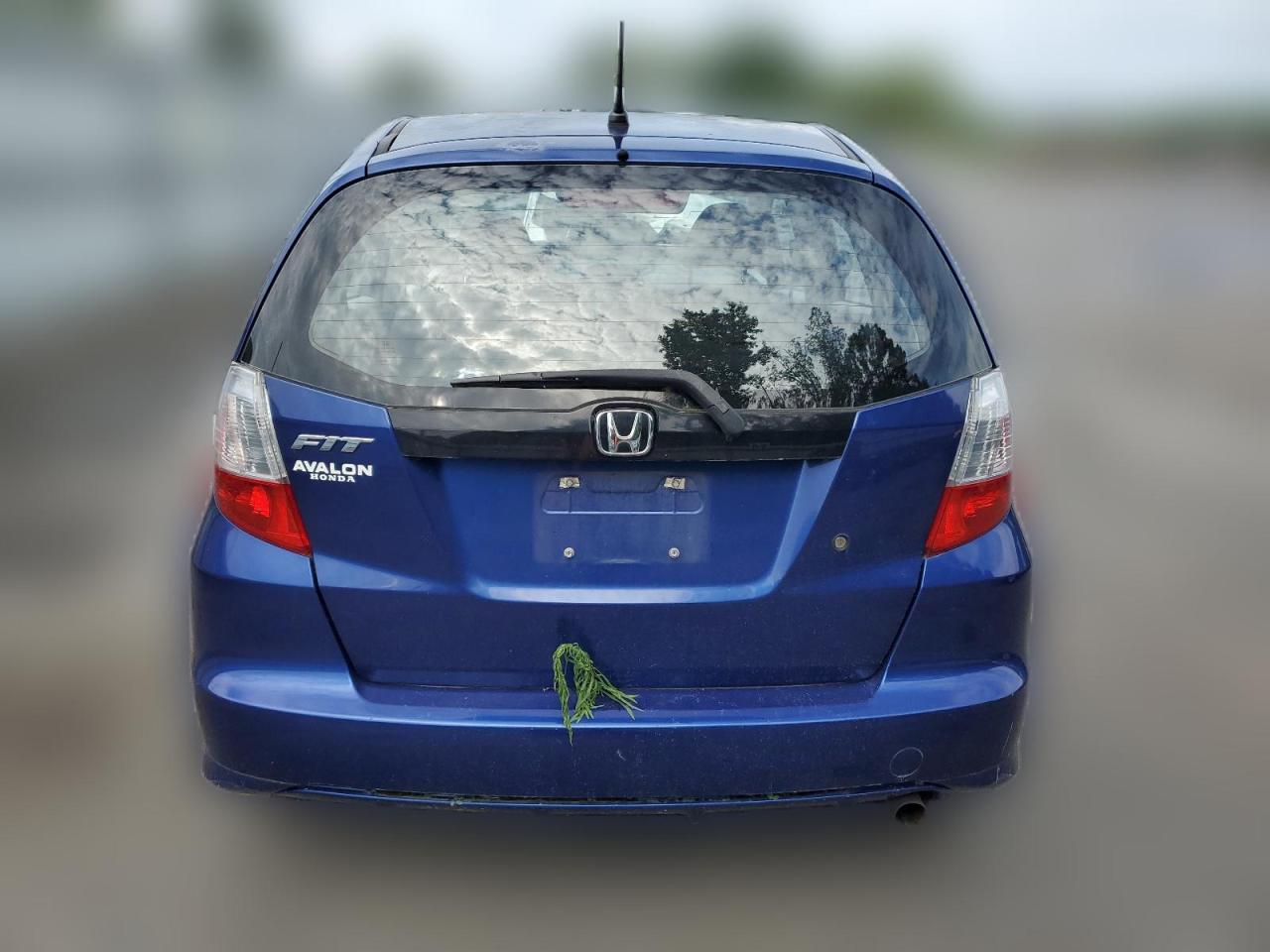 2010 Honda Fit VIN: JHMGE8H22AS027063 Lot: 64357404