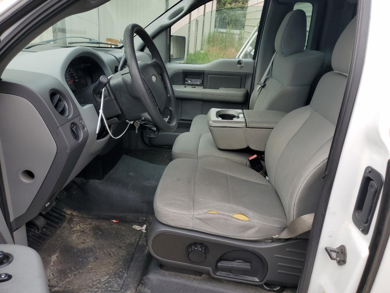 2007 Ford F150 VIN: 1FTRF12287NA87041 Lot: 62312064