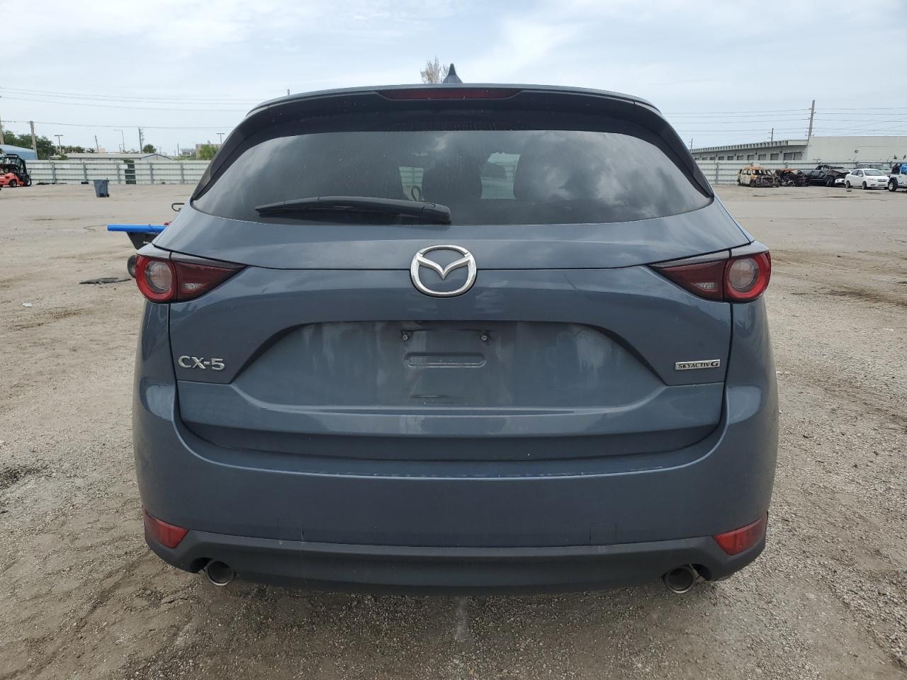 2021 Mazda Cx-5 Touring VIN: JM3KFACM6M0410617 Lot: 62404364