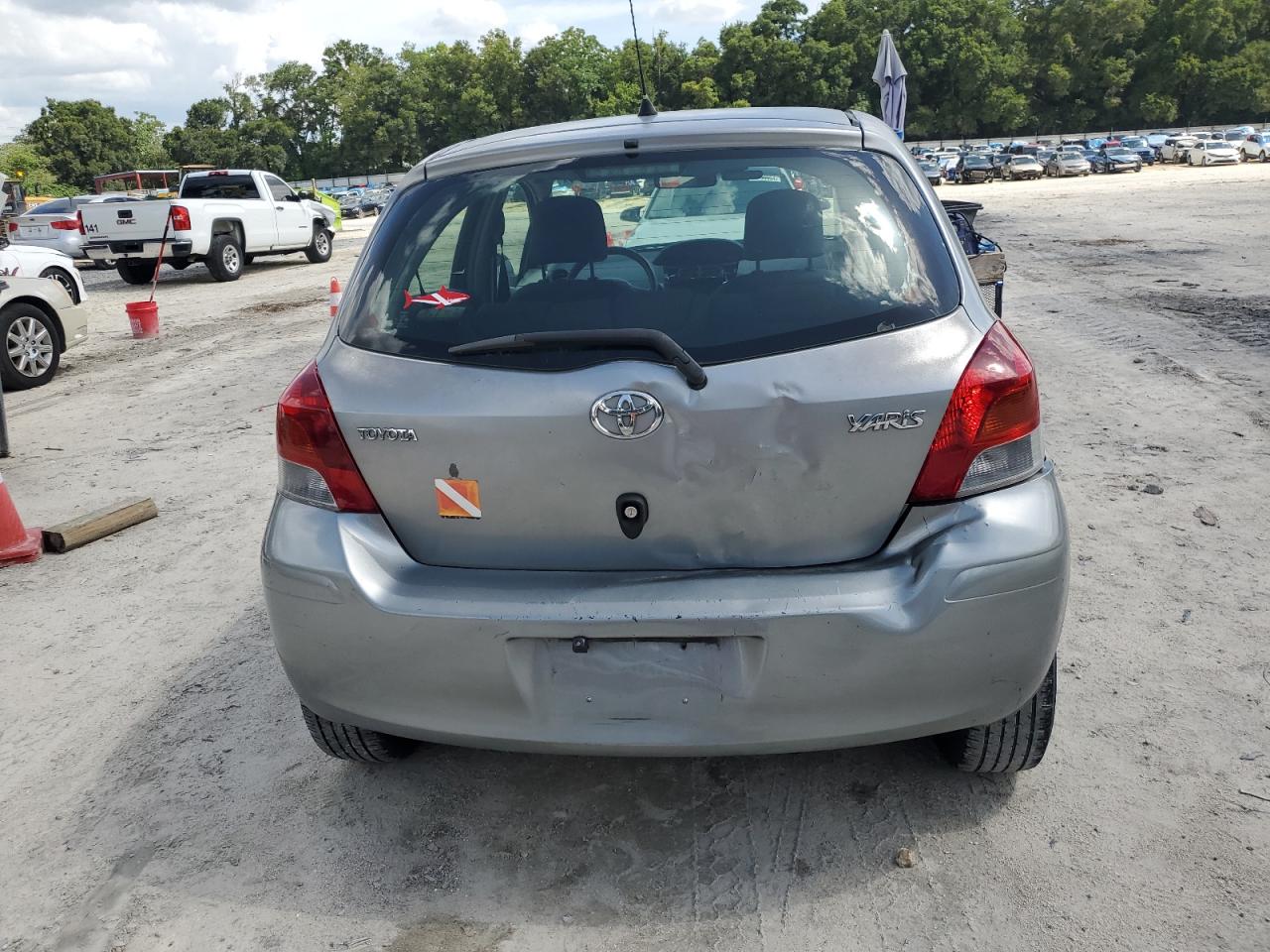 2010 Toyota Yaris VIN: JTDKT4K37A5321861 Lot: 64665524