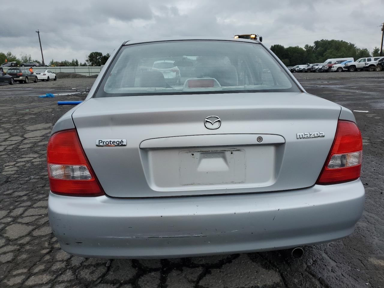 2000 Mazda Protege Dx VIN: JM1BJ2223Y0304760 Lot: 65408004