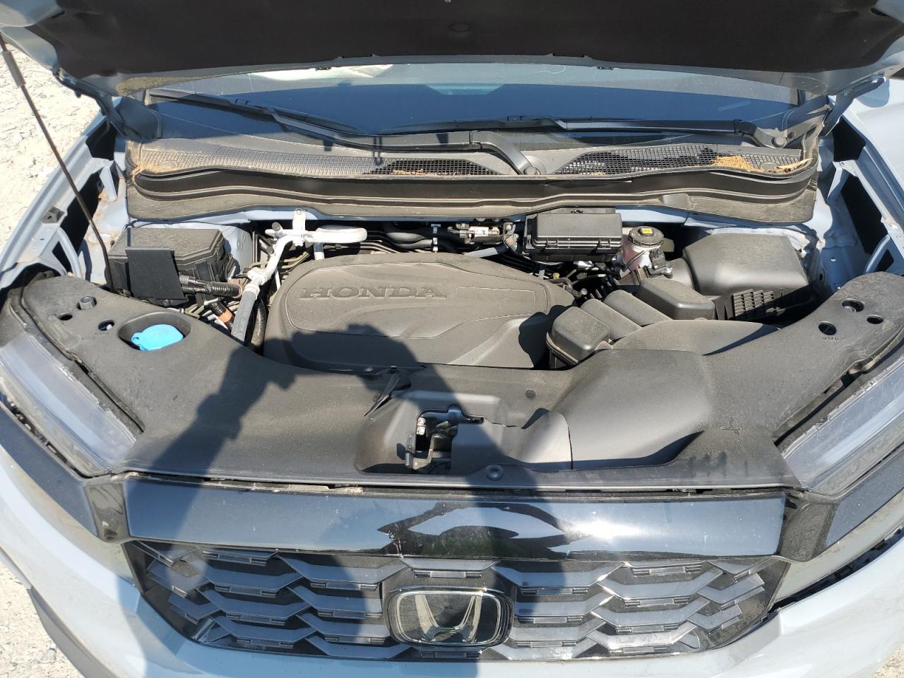 2023 Honda Passport Elite VIN: 5FNYF8H05PB021569 Lot: 63390614