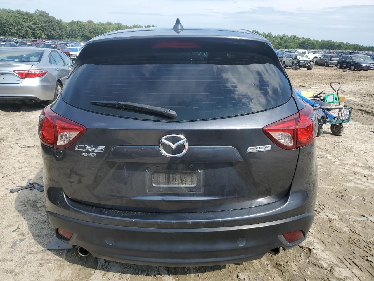 2015 Mazda Cx-5 Sport VIN: JM3KE4BY5F0490729 Lot: 64052584