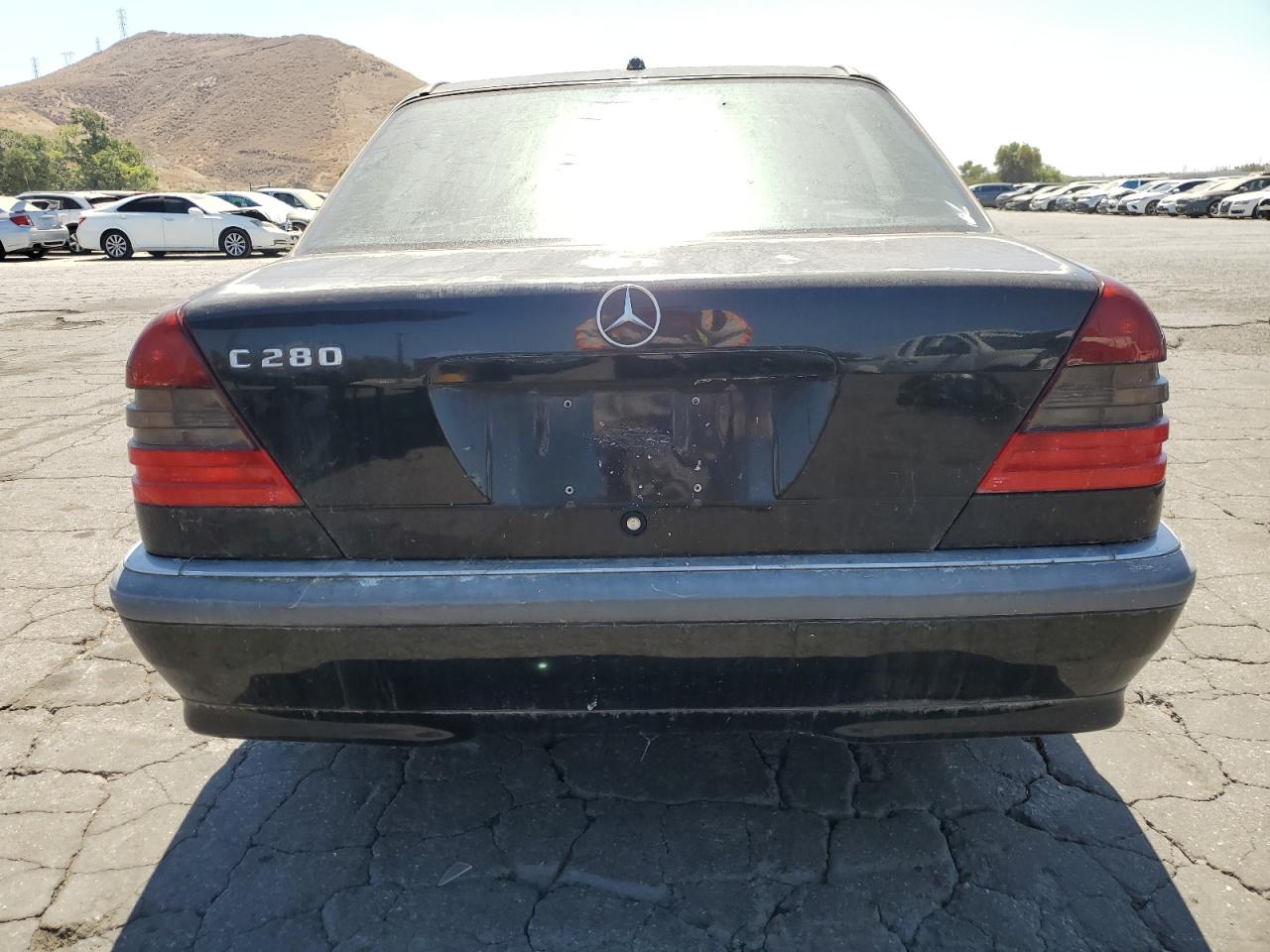 2000 Mercedes-Benz C 280 VIN: WDBHA29G1YA865169 Lot: 64120844