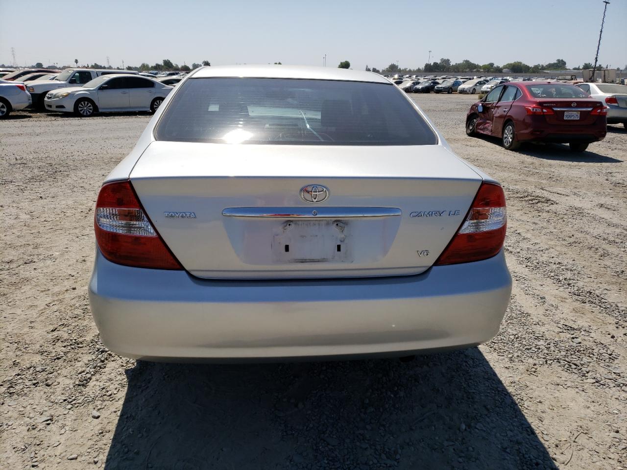 2003 Toyota Camry Le VIN: 4T1BF30K43U556234 Lot: 63875644