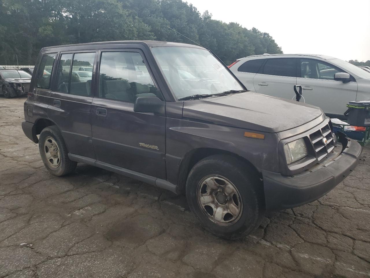 1998 Chevrolet Tracker VIN: 2CNBE1367W6919926 Lot: 63824914