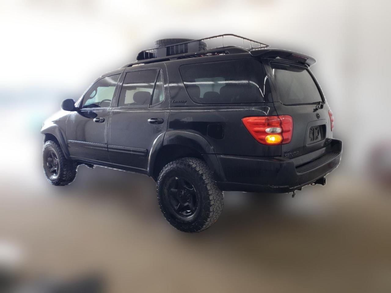 2002 Toyota Sequoia Limited VIN: 5TDBT48A02S136326 Lot: 63001544