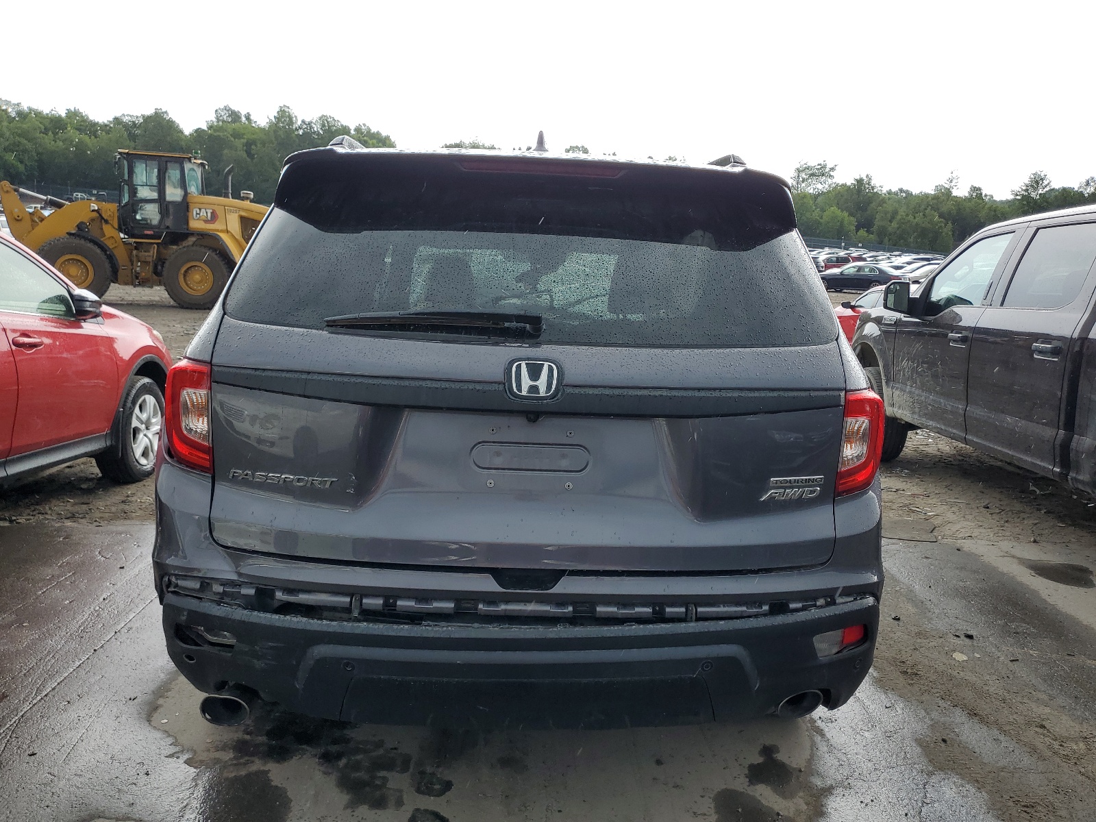 2021 Honda Passport Touring vin: 5FNYF8H92MB023497