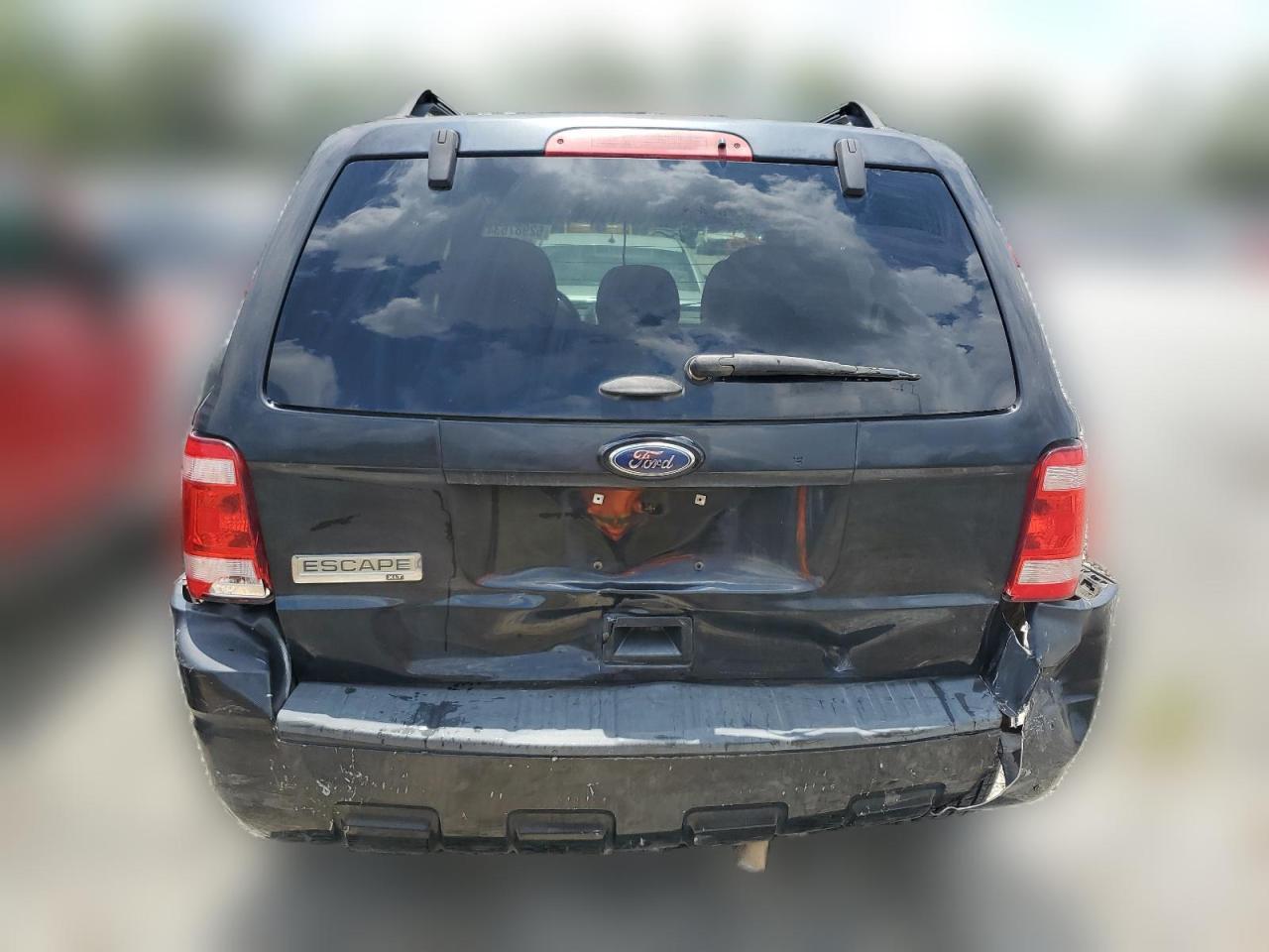 2011 Ford Escape Xlt VIN: 1FMCU0D73BKB74592 Lot: 62987634