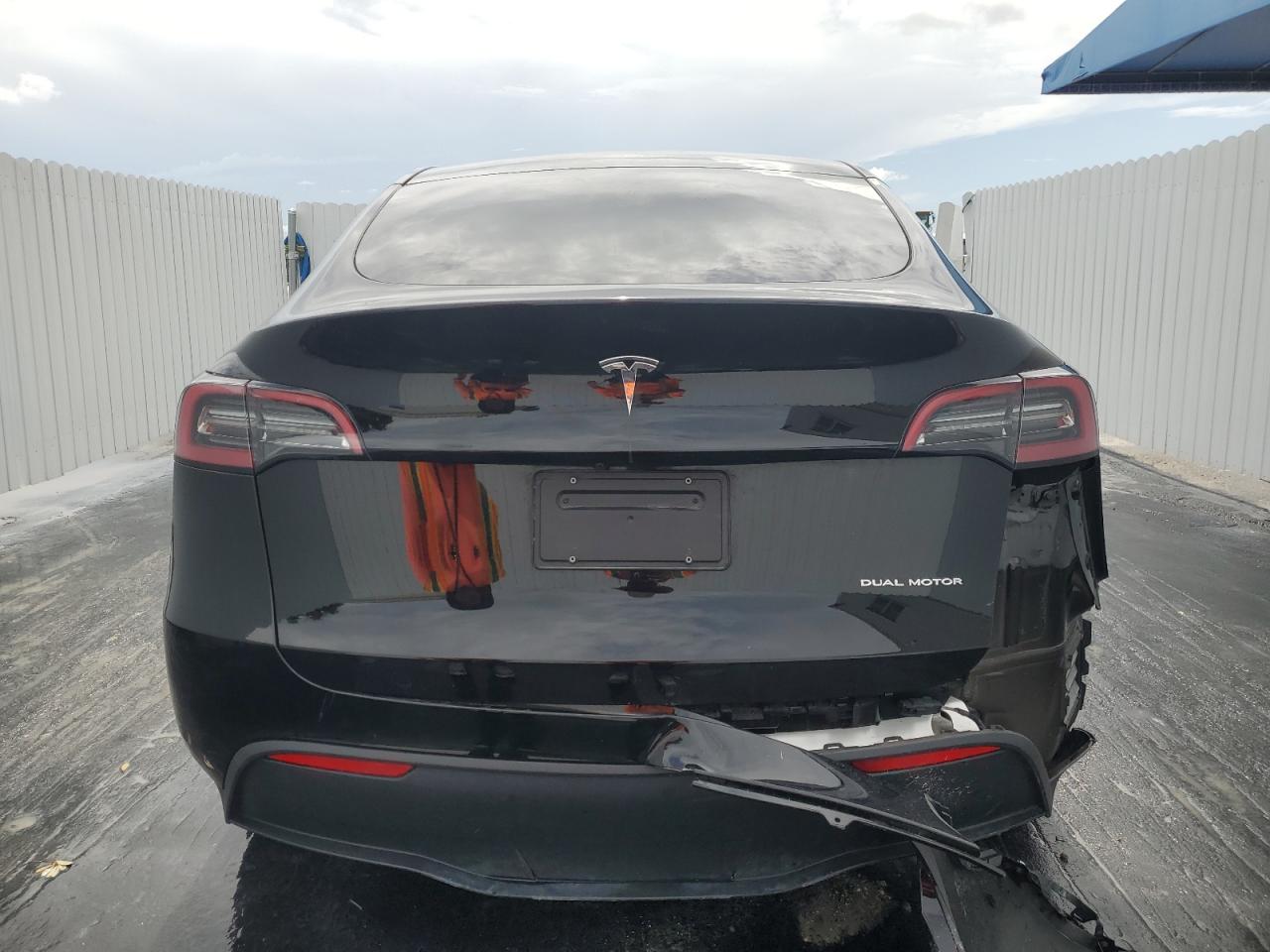 2023 Tesla Model Y VIN: 7SAYGDEE3PA044208 Lot: 63053354