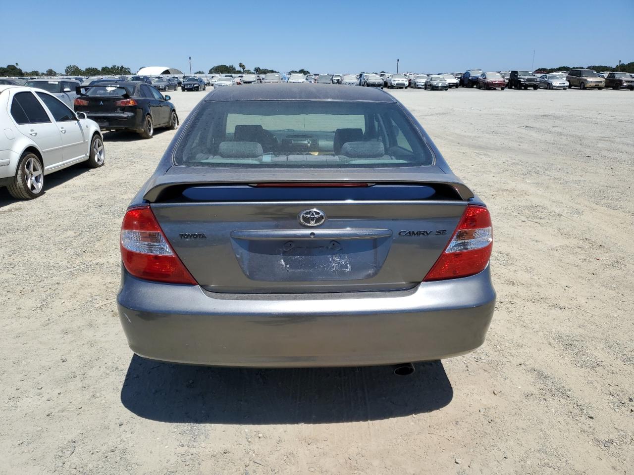 2002 Toyota Camry Le VIN: JTDBE30K820051259 Lot: 62078524