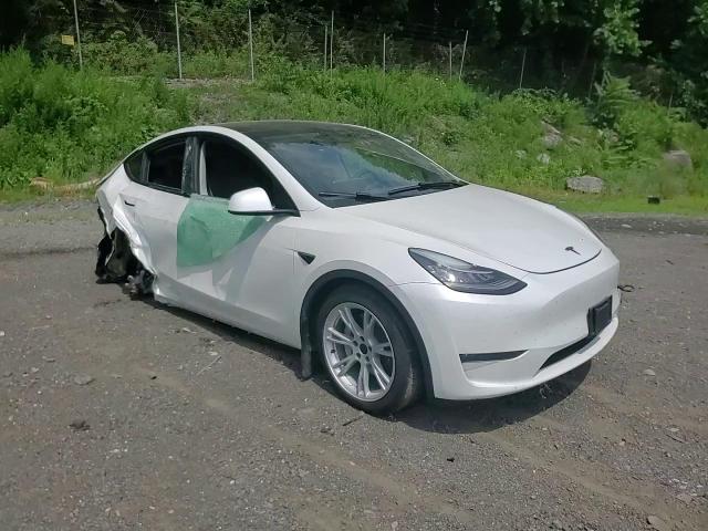 2023 Tesla Model Y VIN: 7SAYGDEE9PA041992 Lot: 62090444