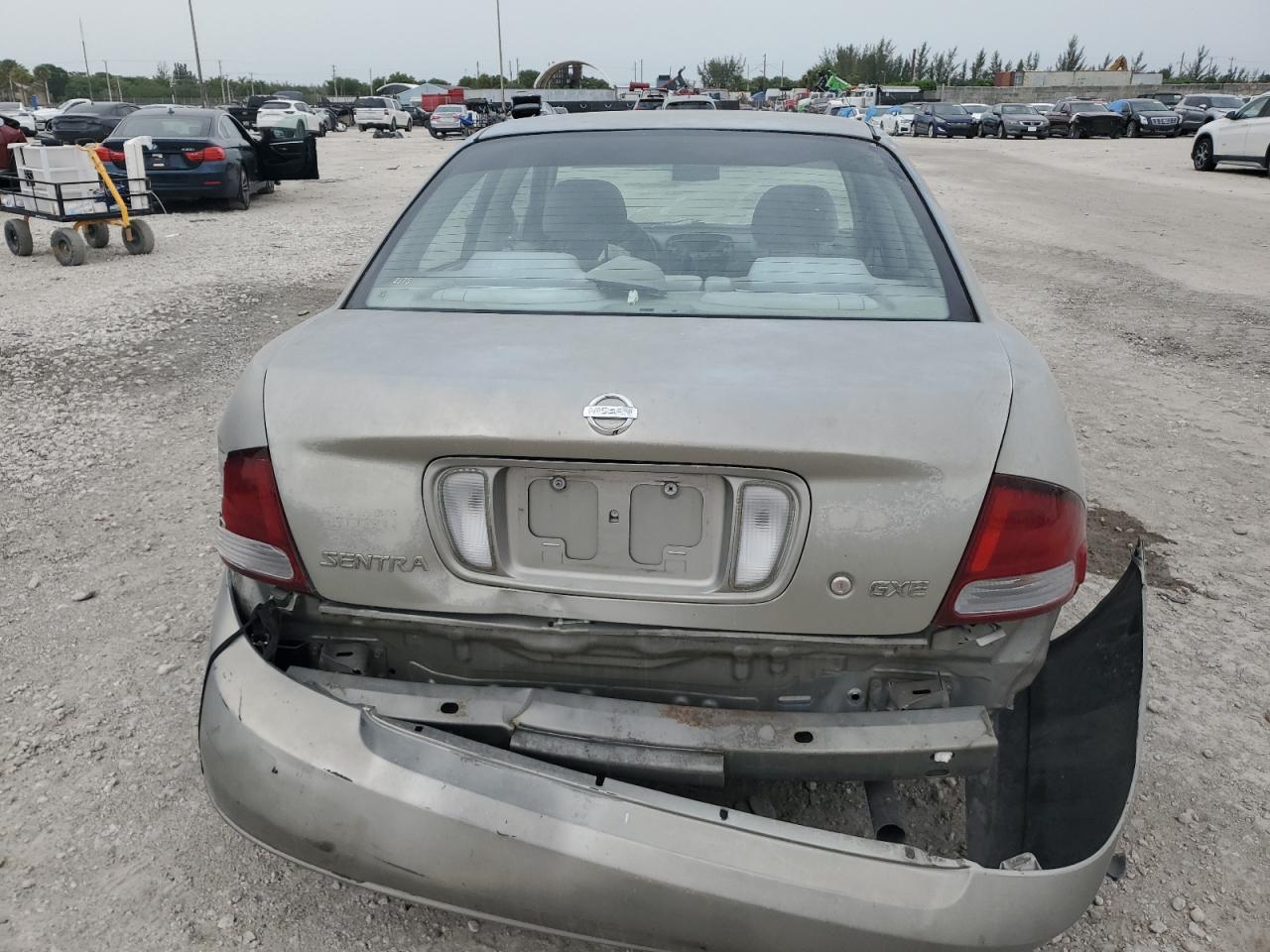 2003 Nissan Sentra Xe VIN: 3N1CB51DX3L804094 Lot: 62476804