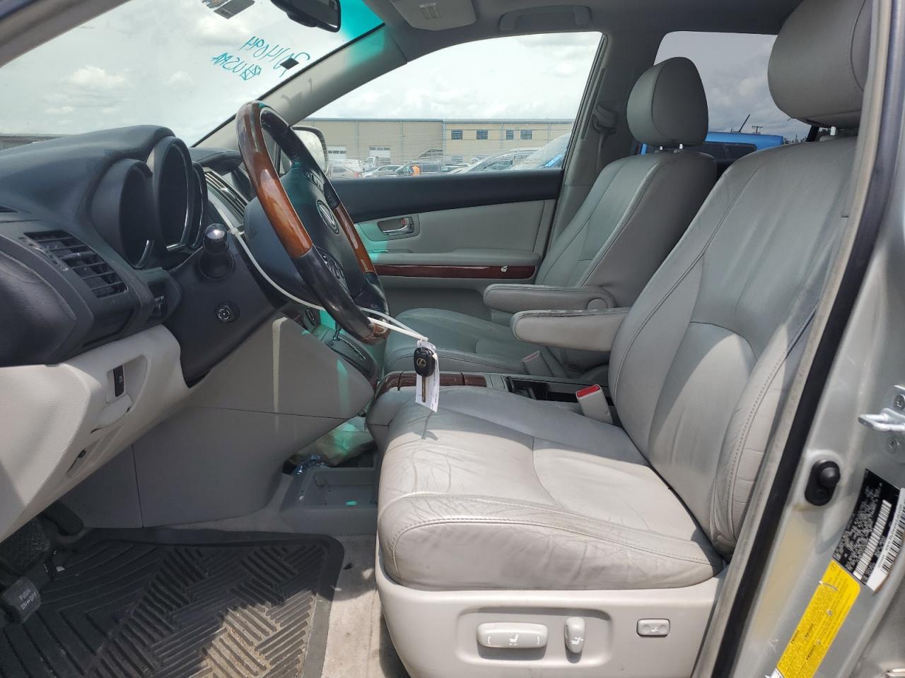 2007 Lexus Rx 400H VIN: JTJGW31U072002858 Lot: 63409984