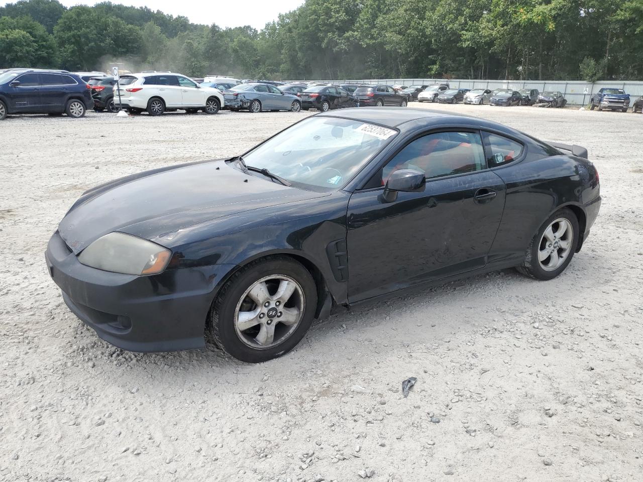 2005 Hyundai Tiburon VIN: KMHHM65D15U184592 Lot: 62537064
