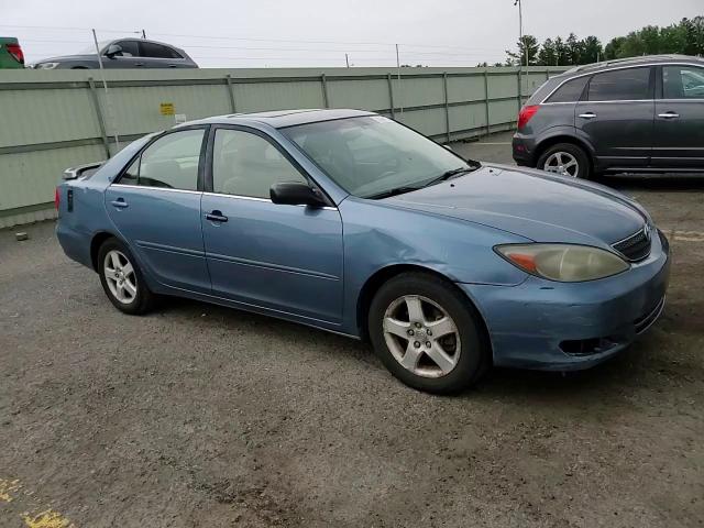 2003 Toyota Camry Le VIN: 4T1BF32K63U552814 Lot: 63996774