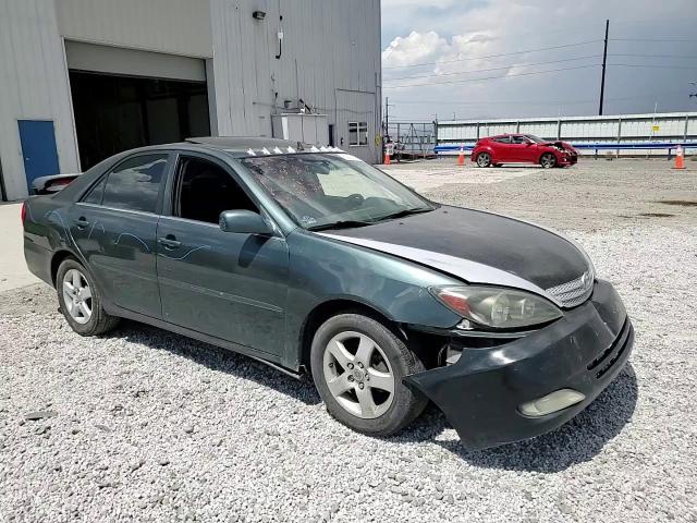 2003 Toyota Camry Le VIN: 4T1BE32K13U748596 Lot: 63675334