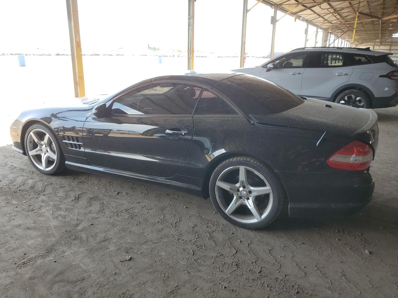 2009 Mercedes-Benz Sl 550 VIN: WDBSK71F59F143095 Lot: 61291984