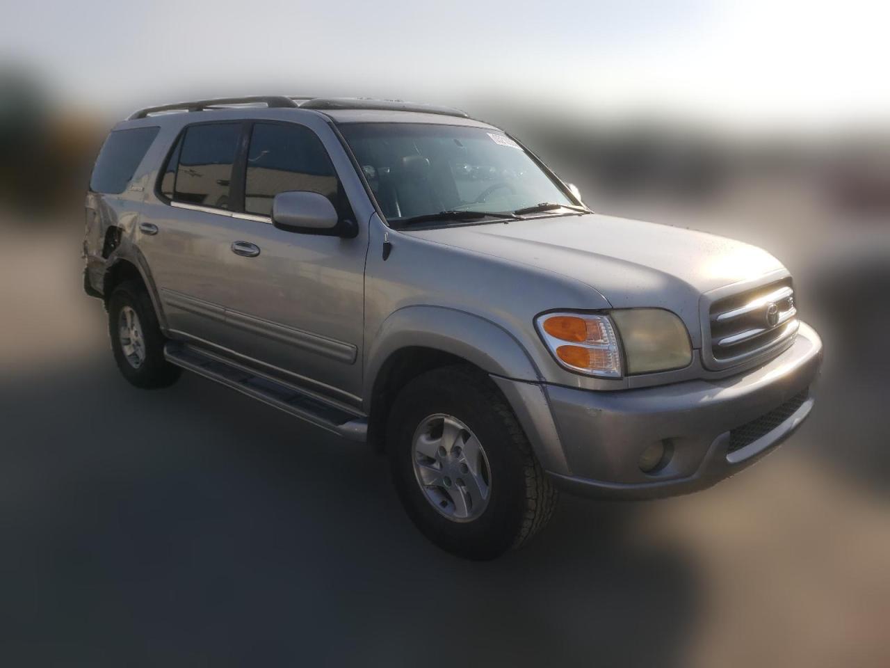 2002 Toyota Sequoia Limited VIN: 5TDZT38A52S069571 Lot: 65210384