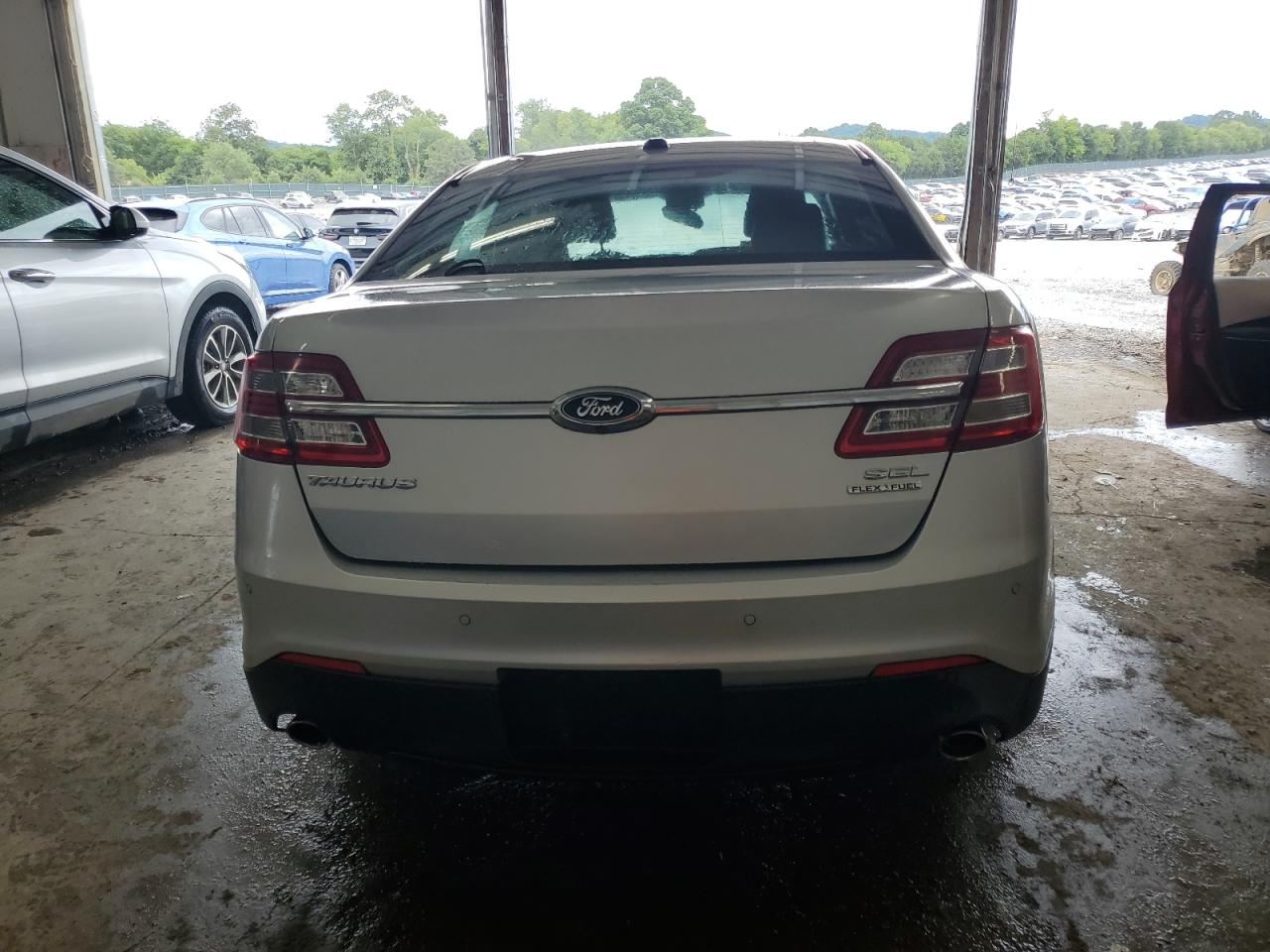 2015 Ford Taurus Sel VIN: 1FAHP2E82FG182492 Lot: 61063344