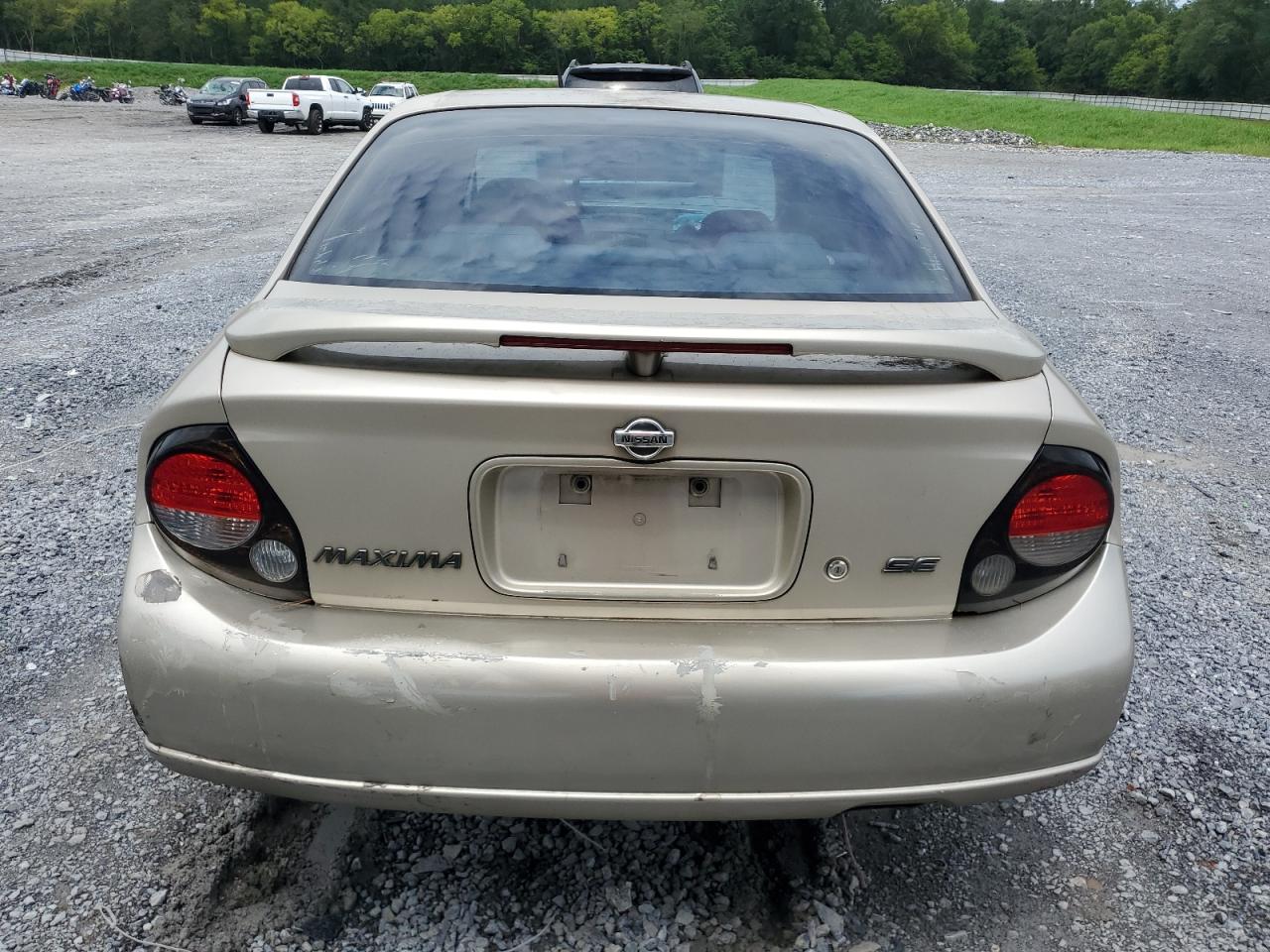 2000 Nissan Maxima Gle VIN: JN1CA31D0YT557033 Lot: 64001184