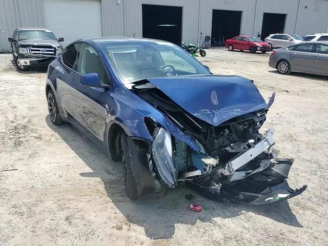 2023 Tesla Model Y VIN: 7SAYGDEE0PF936564 Lot: 63034254