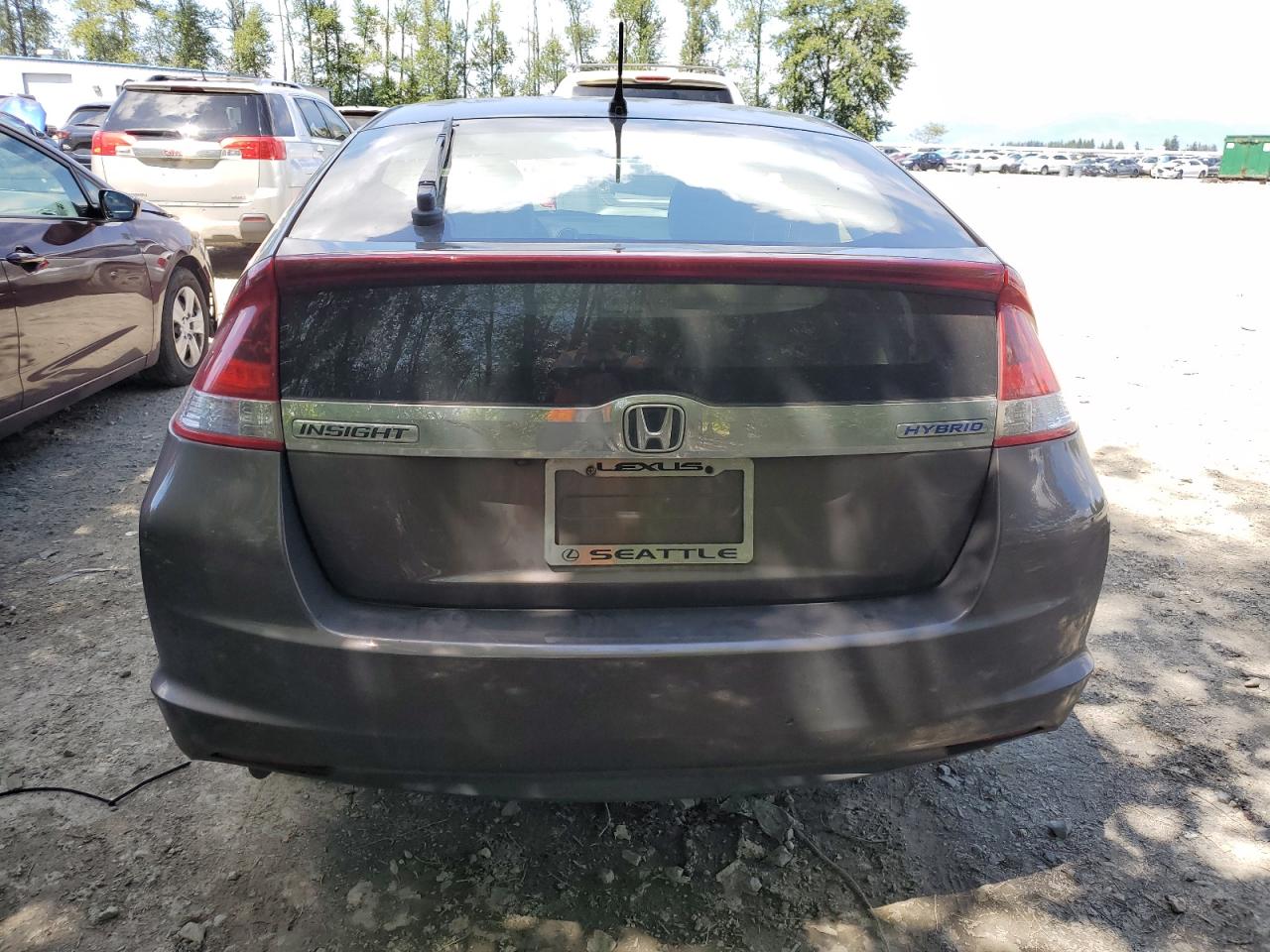 2014 Honda Insight Ex VIN: JHMZE2H78ES002210 Lot: 61770464