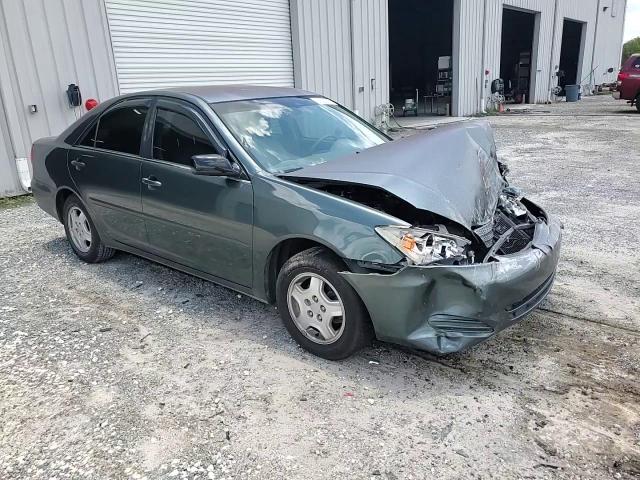 2003 Toyota Camry Le VIN: 4T1BF30K73U564635 Lot: 61233274