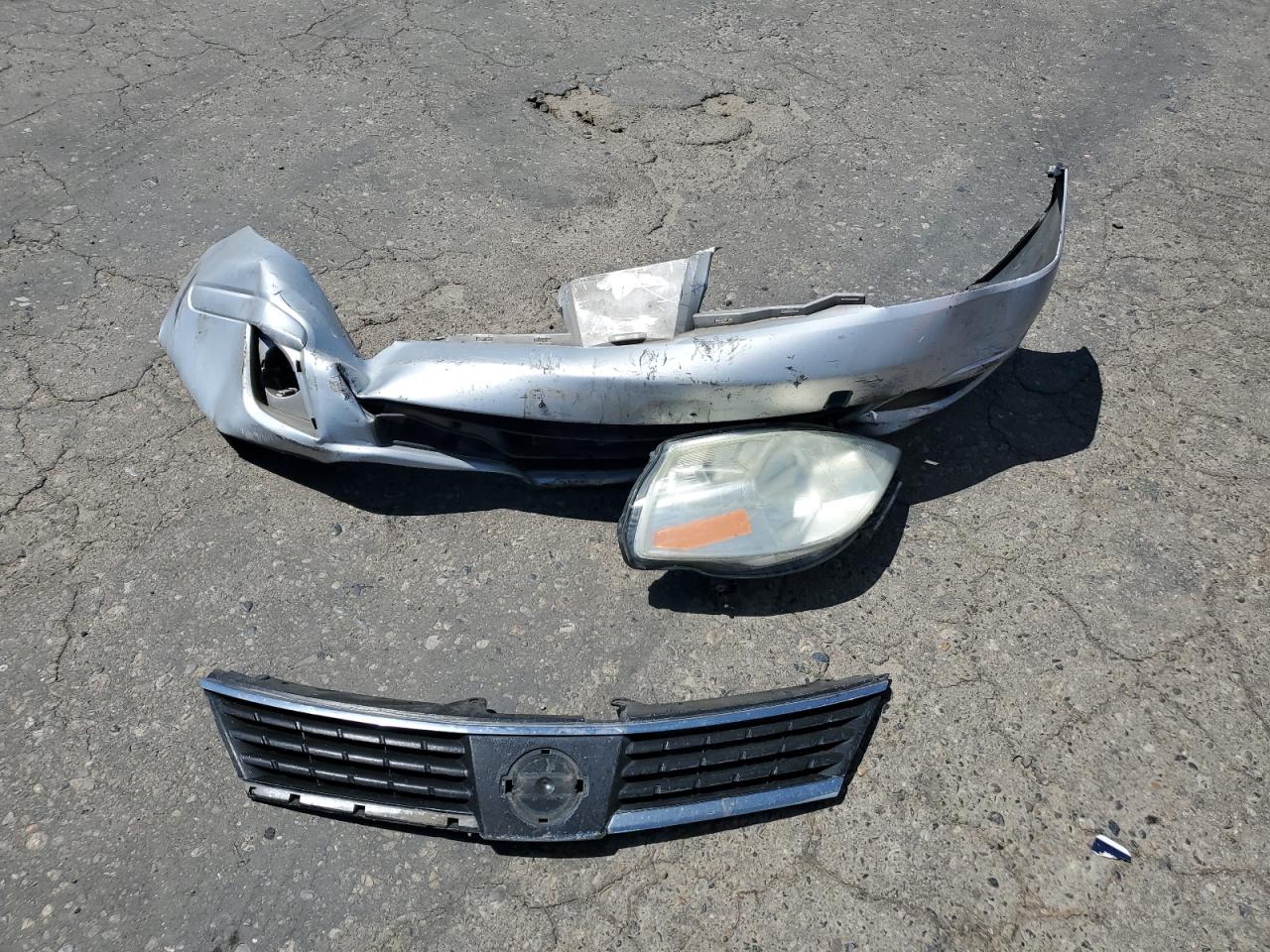 2009 Nissan Versa S VIN: 3N1BC11E79L395619 Lot: 61518874