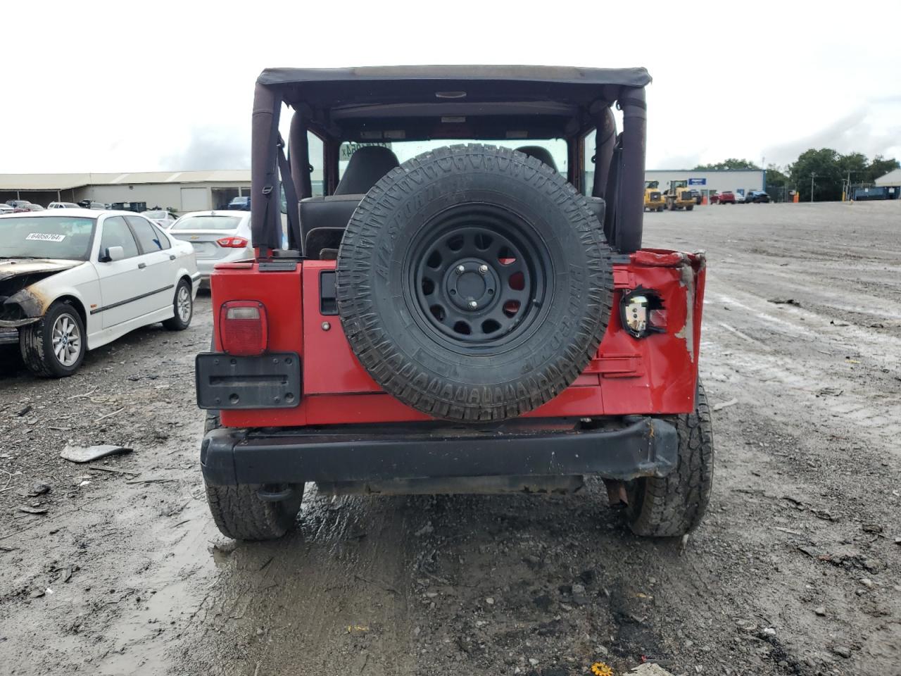 2000 Jeep Wrangler / Tj Sport VIN: 1J4FA49SXYP725086 Lot: 64471954