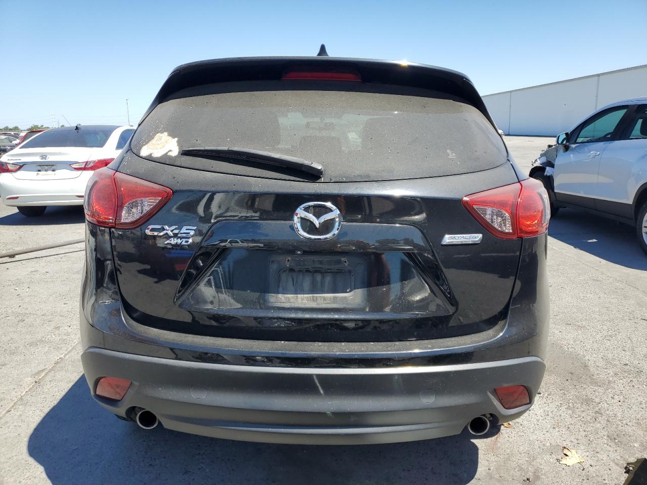 2014 Mazda Cx-5 Touring VIN: JM3KE4CY2E0302715 Lot: 63281434