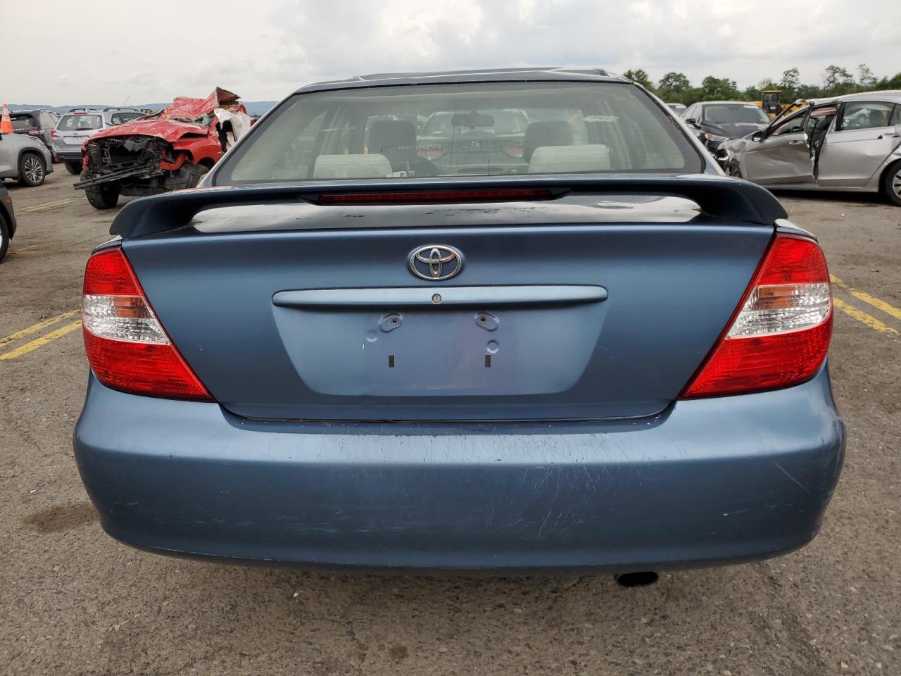 2003 Toyota Camry Le VIN: 4T1BF32K63U552814 Lot: 63996774