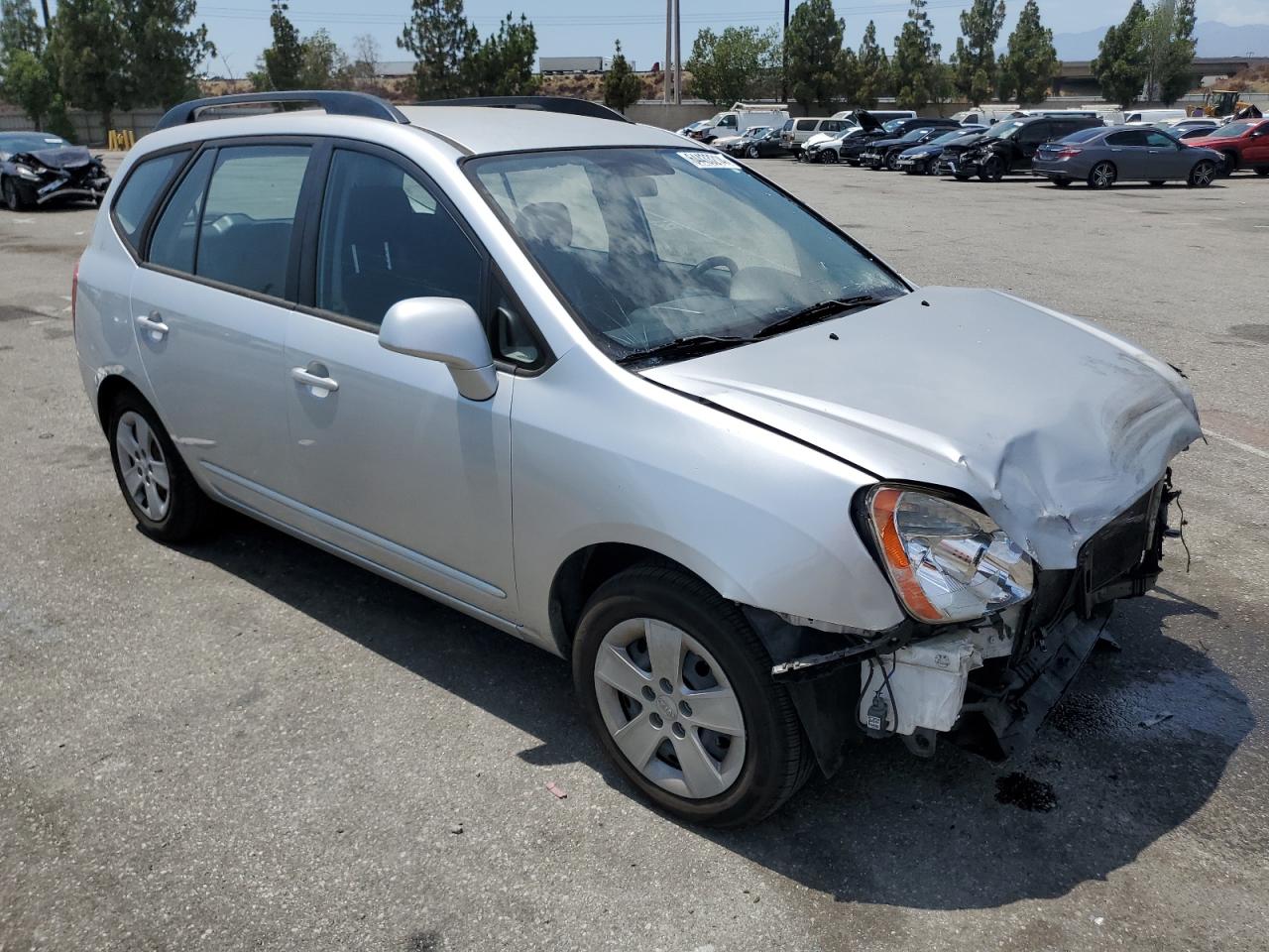 2009 Kia Rondo Base VIN: KNAFG529X97276282 Lot: 64433214