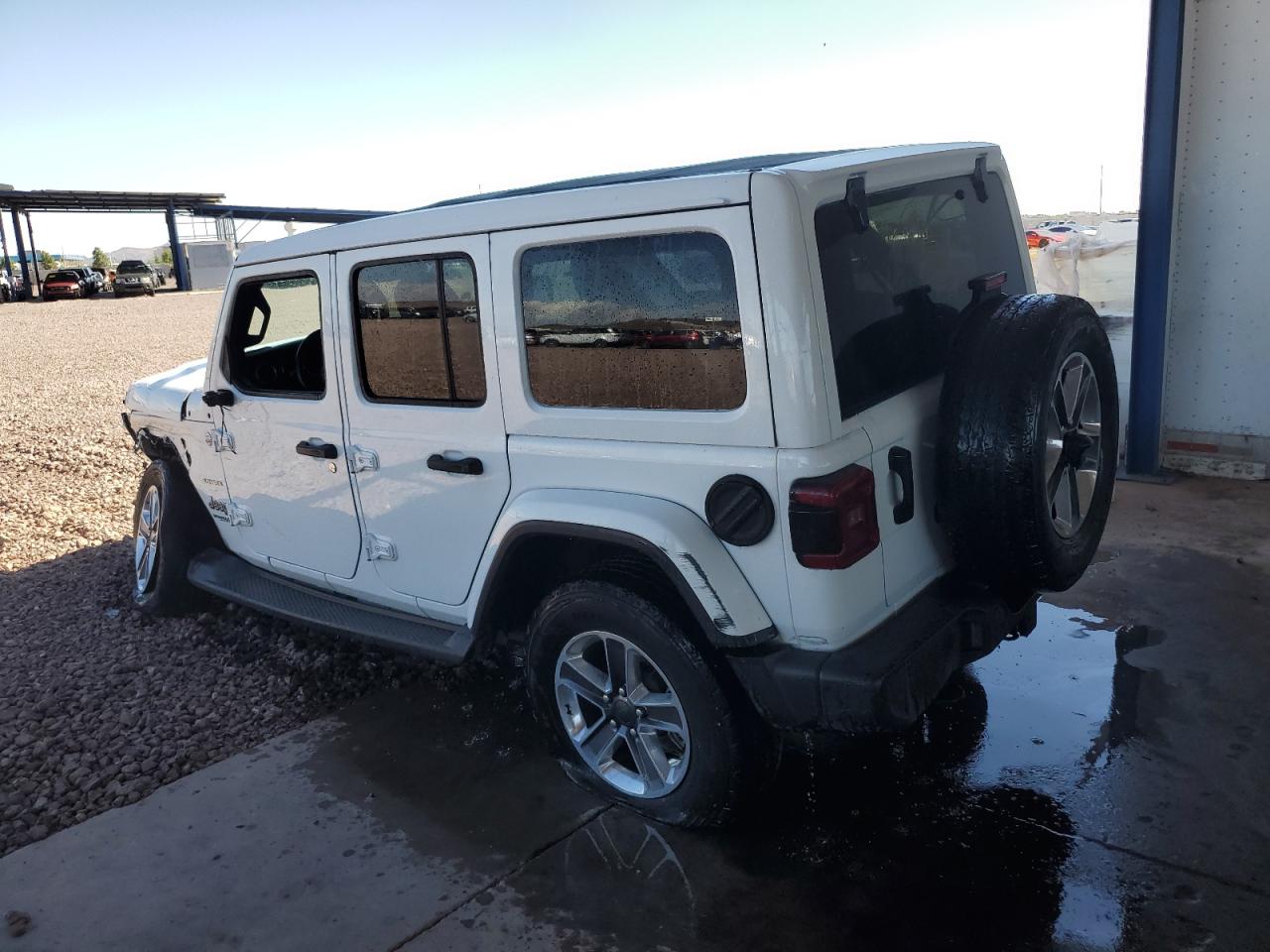 1C4HJXEG3MW606653 Jeep Wrangler U 2