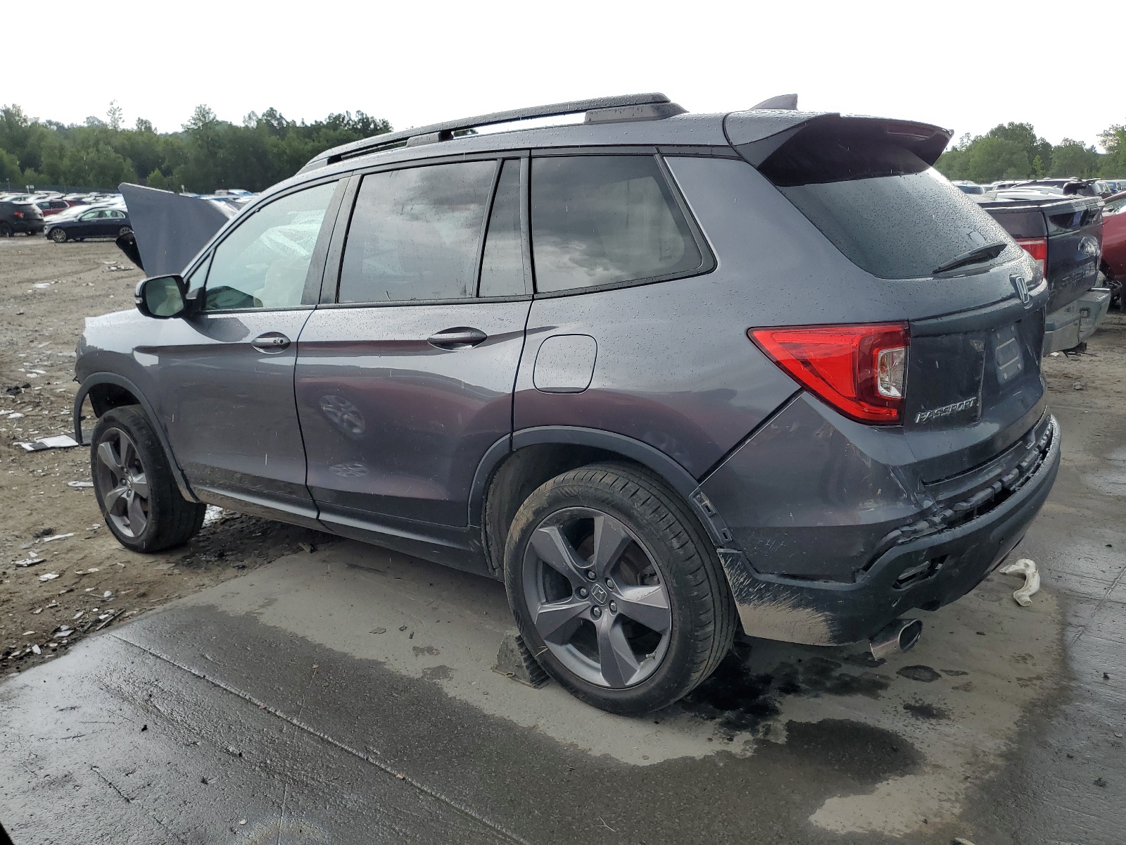 2021 Honda Passport Touring vin: 5FNYF8H92MB023497